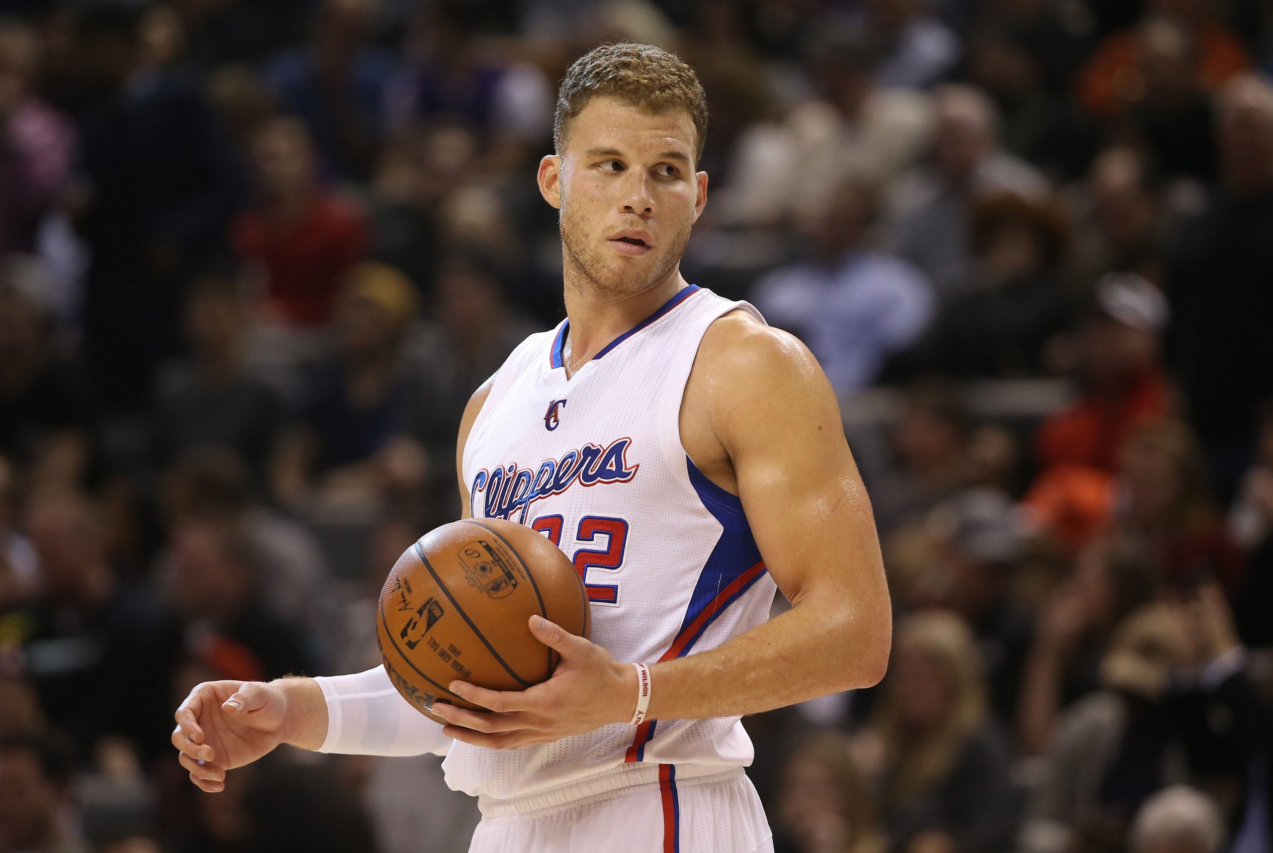 The basket ball players family can be seen at Blake Griffin family, his fat...